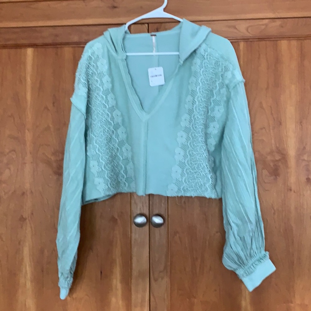 Free People sweater. New with tags. Size small